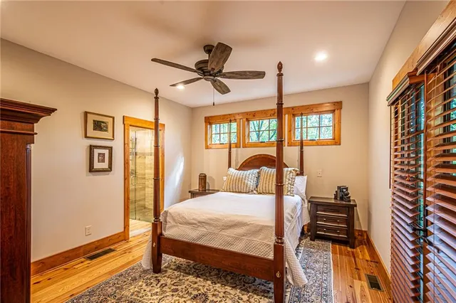 a view of a balcony with wooden floor