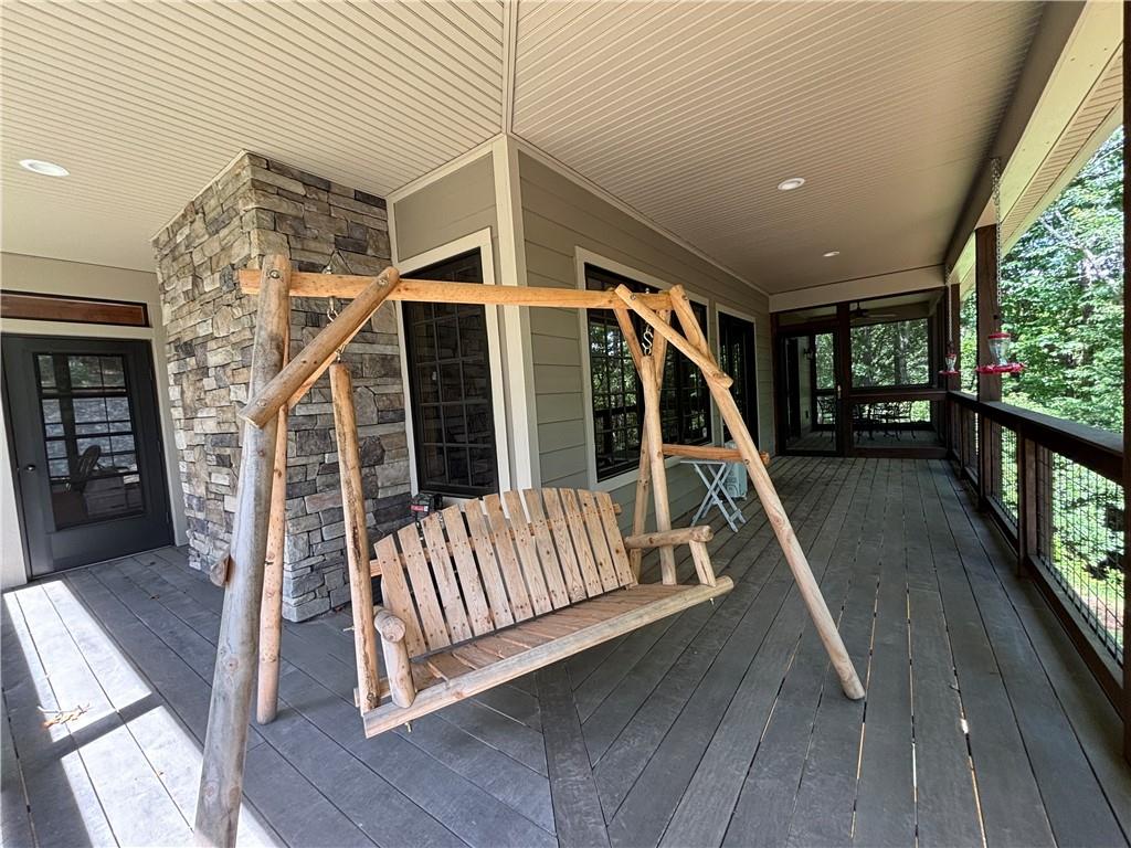 1038 Wilkins Cove Road Suches, GA 30572 - Photo 37 of 89 a view of entryway with stairs and wooden floor