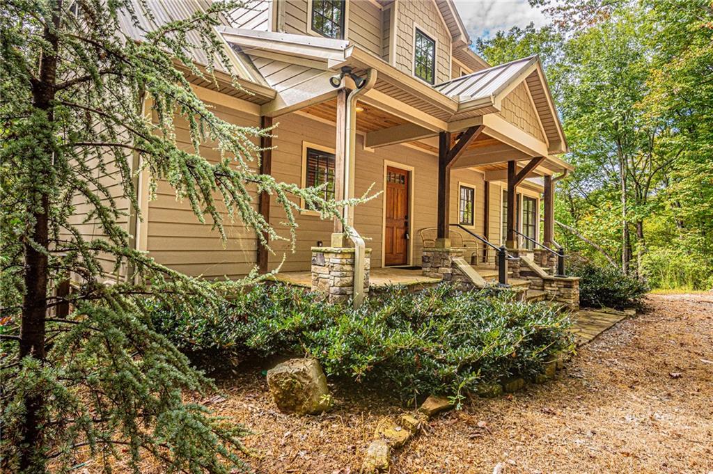 1038 Wilkins Cove Road Suches, GA 30572 - Photo 64 of 89 a front view of a house with a yard