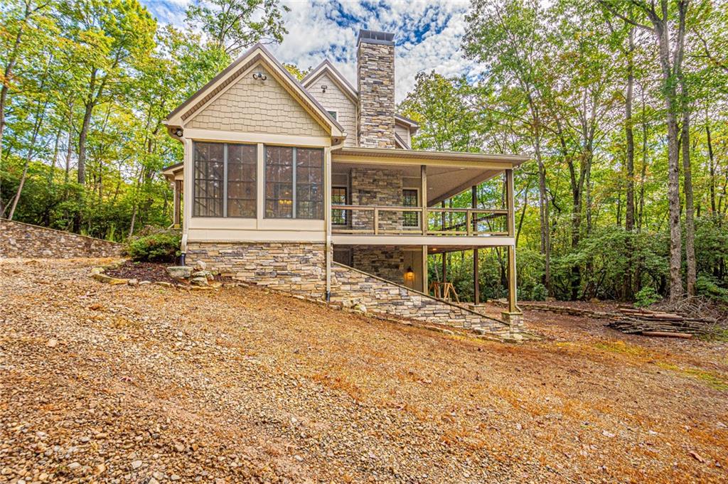 1038 Wilkins Cove Road Suches, GA 30572 - Photo 67 of 89 front view of a house with a yard