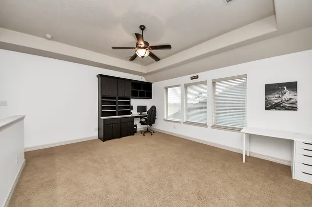 a view of a livingroom with a flat screen tv