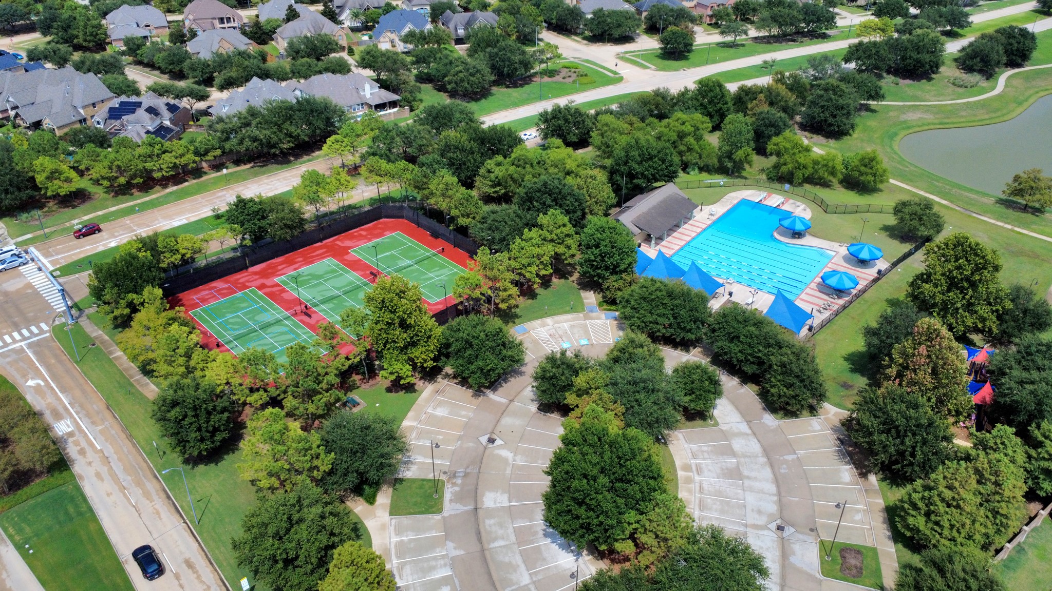 10410 Mossback Pine Road Katy, TX 77494 - Photo 31 of 34 an aerial view of residential house with outdoor space and swimming pool