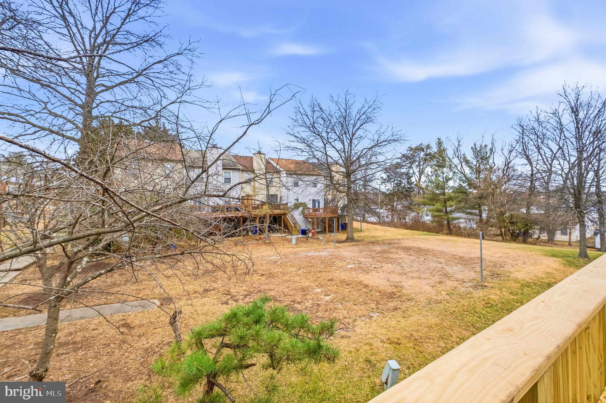 15012 Wheatland Place Laurel, MD 20707 - Photo 24 of 24 a view of yard covered with snow in front of house