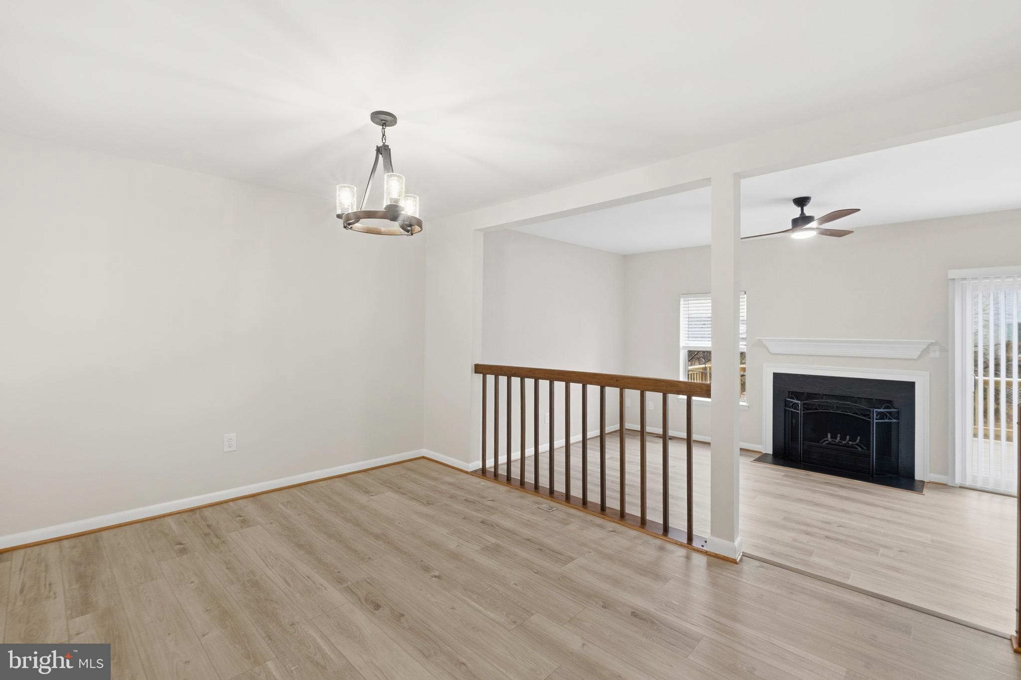 15012 Wheatland Place Laurel, MD 20707 - Photo 5 of 24 a very nice looking empty room with a fireplace