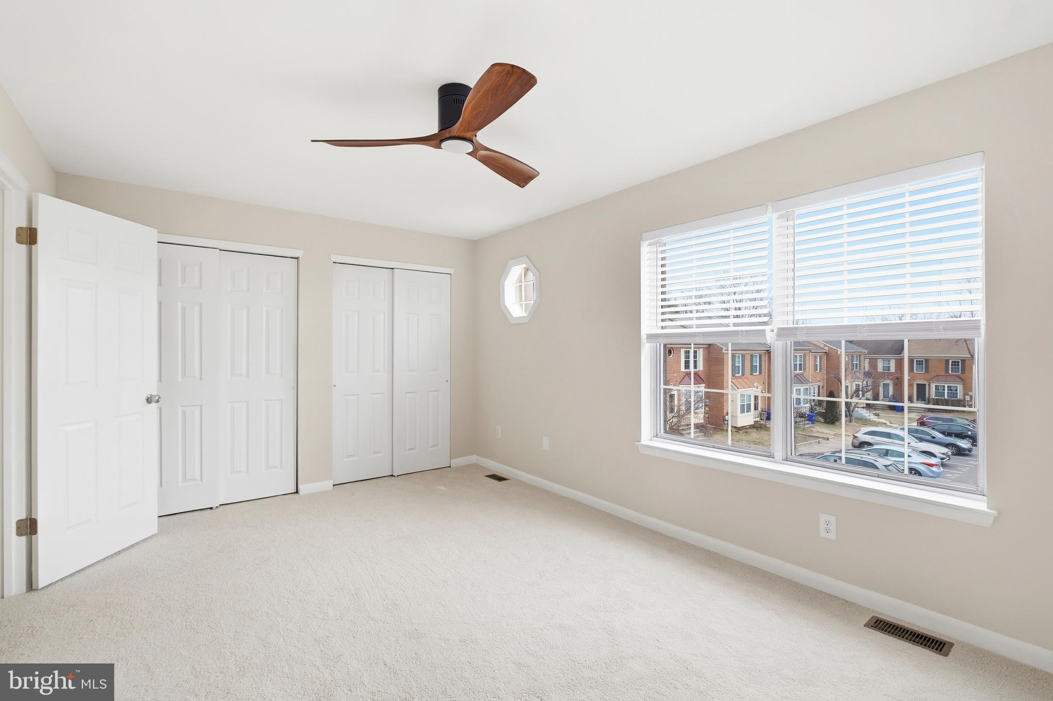 15012 Wheatland Place Laurel, MD 20707 - Photo 8 of 24 a view of an empty room with a window