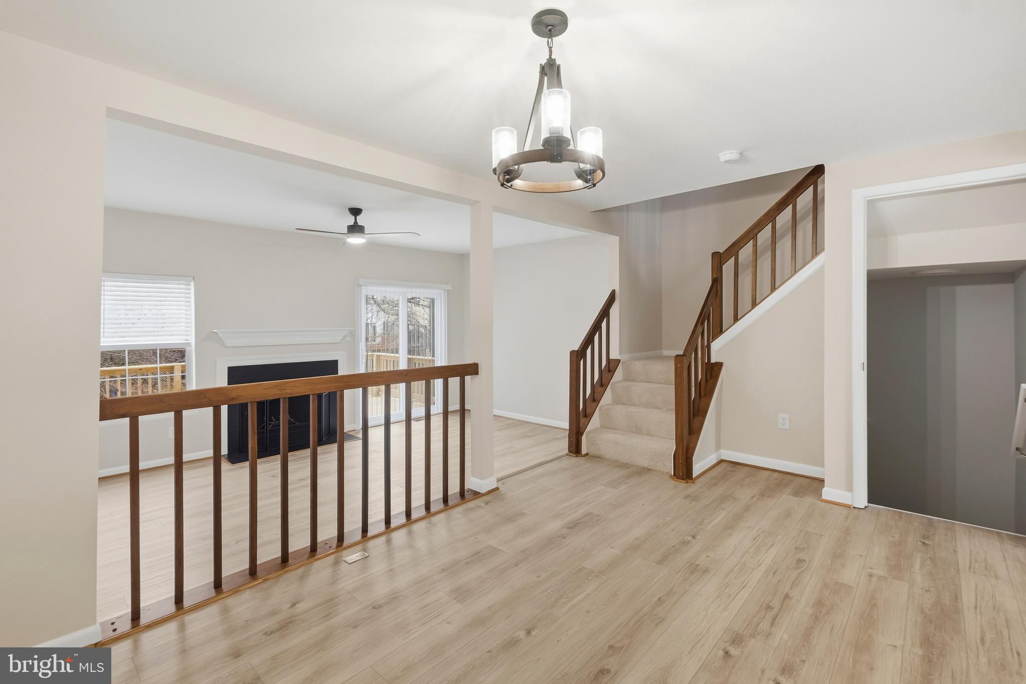 15012 Wheatland Place Laurel, MD 20707 - Photo 9 of 24 a view of an entryway with wooden floor