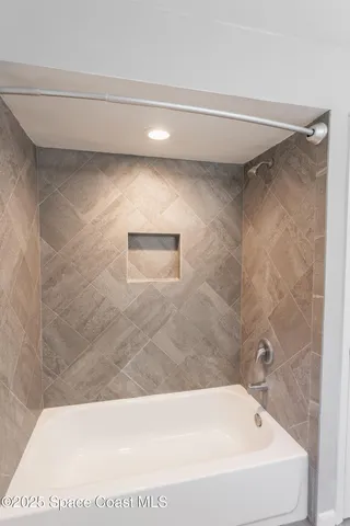 a bathroom with a bathtub