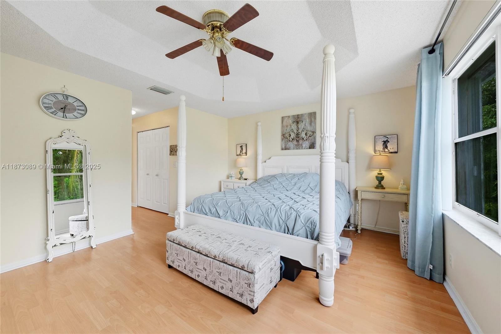 15025 Southwest 19th Court Miramar, FL 33027 - Photo 14 of 28 a living room with a bed furniture and a window