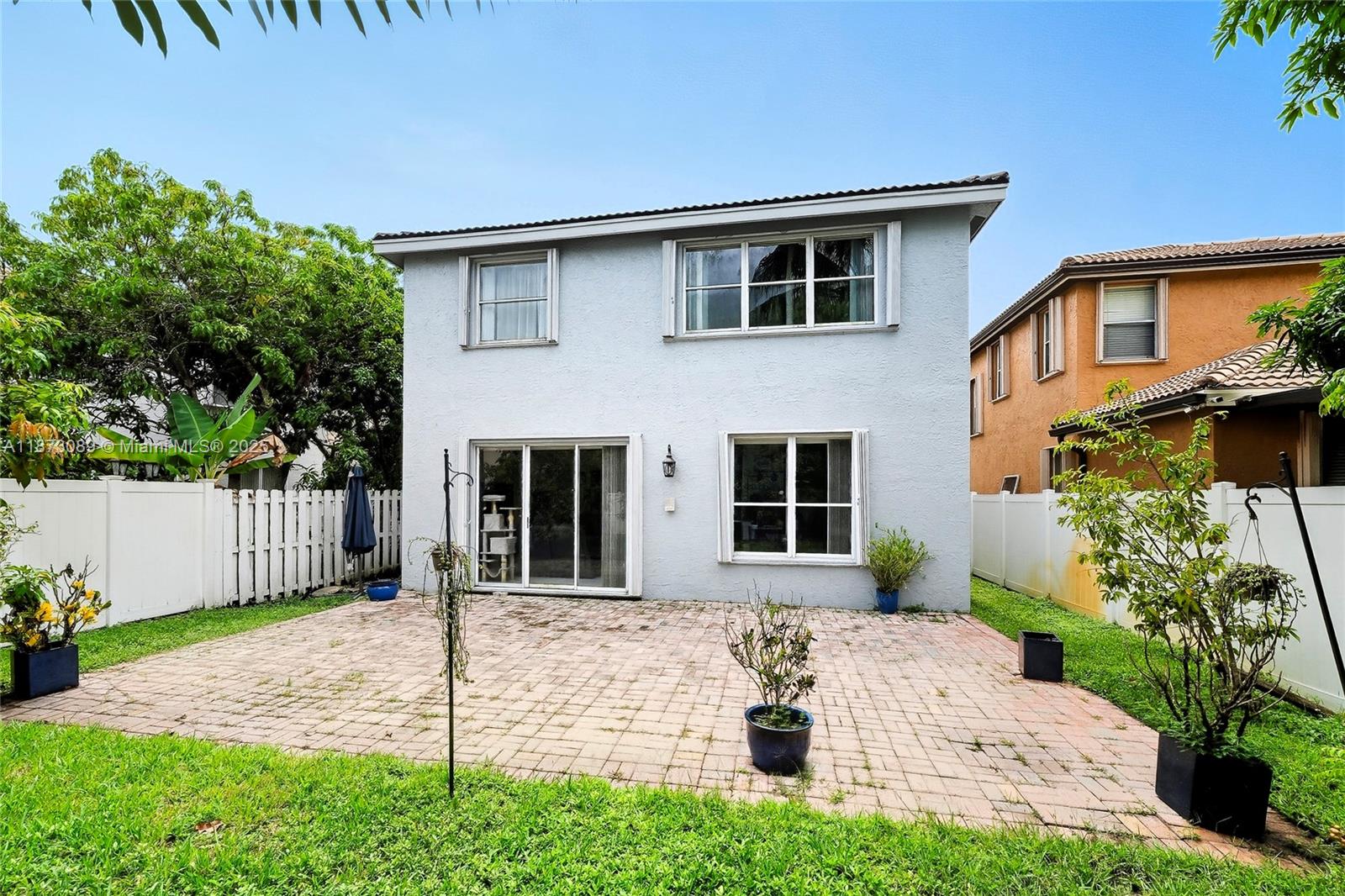 15025 Southwest 19th Court Miramar, FL 33027 - Photo 23 of 28 a front view of a house with a yard