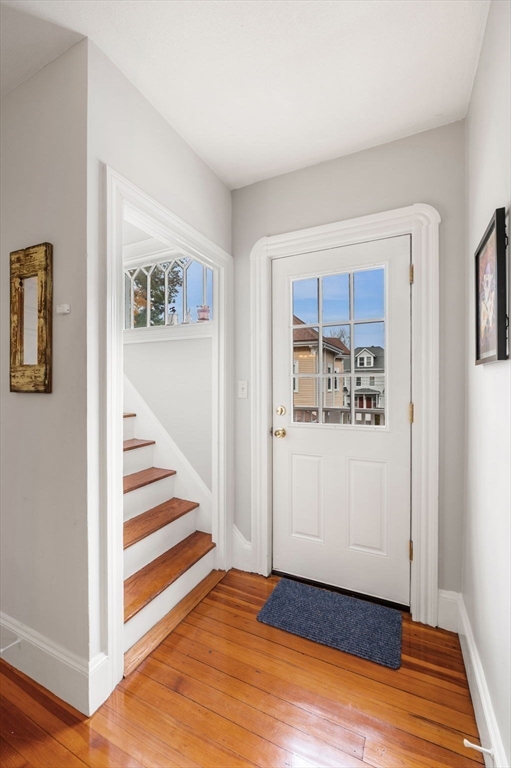 73 Orange Street, Unit 2 Waltham, MA 02453 - Photo 18 of 40 a view of entryway with wooden floor