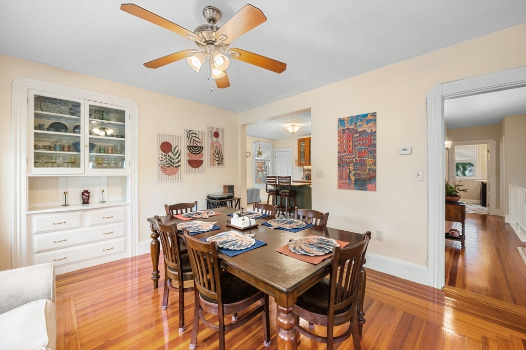 73 Orange Street, Unit 2 Waltham, MA 02453 - Photo 6 of 40 a view of a dining room with furniture window and wooden floor