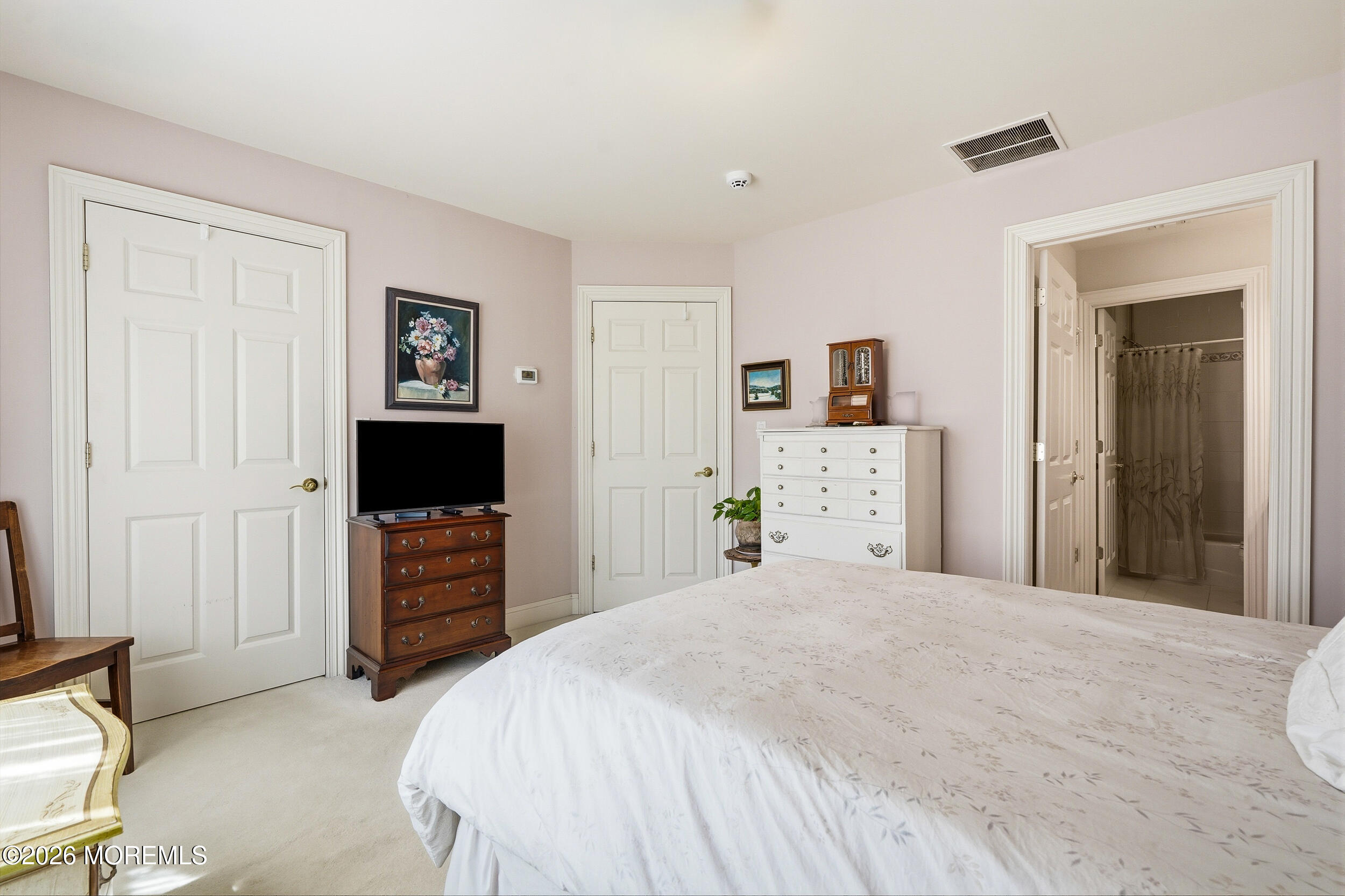 478 Rickey Lane Long Branch, NJ 07740 - Photo 48 of 64 a bedroom with a bed and a flat screen tv