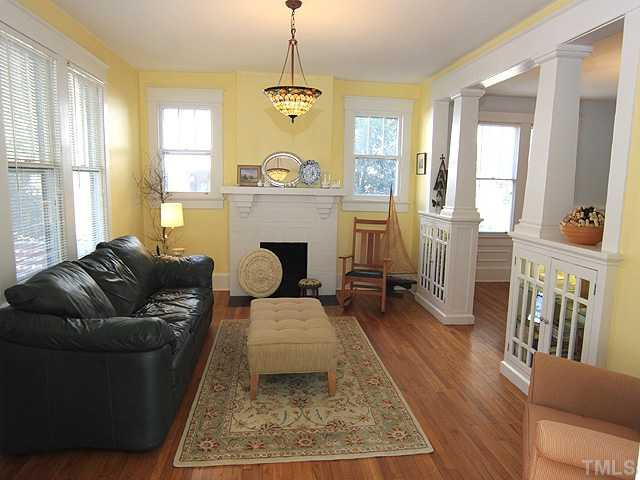 706 North East Street Raleigh, NC 27604 - Photo 2 of 14 Classic Craftsman details abound in this beautiful home. Entry foyer leads into this welcoming, light living room which features built in, lighted bookcases. Living Room