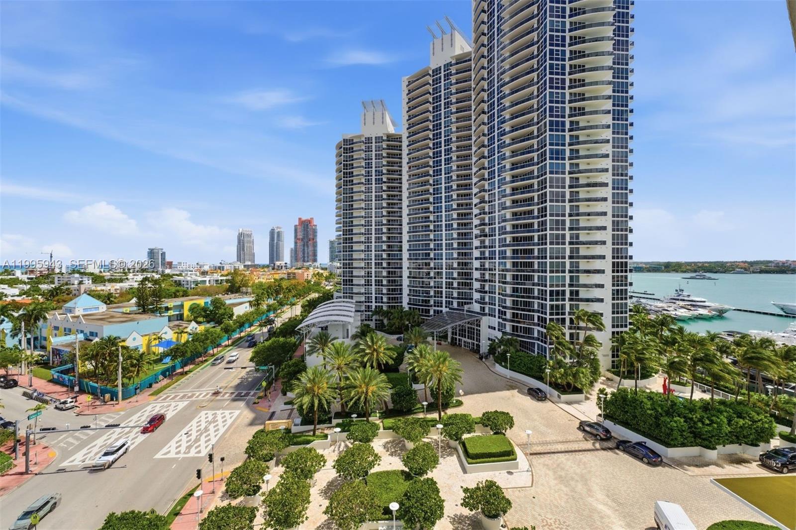 450 Alton Road, Unit 910 Miami Beach, FL 33139 - Photo 19 of 53 View from balcony- South. Bay, marina, South Pointe, ocean, and city views.