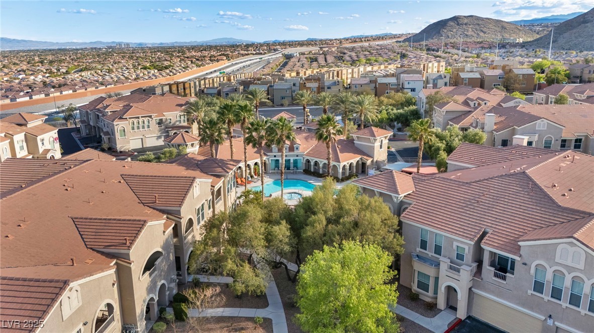 10550 West Alexander Road, Unit 2103 Las Vegas, NV 89129 - Photo 41 of 45 Birds eye view of property with a residential view and a mountain view