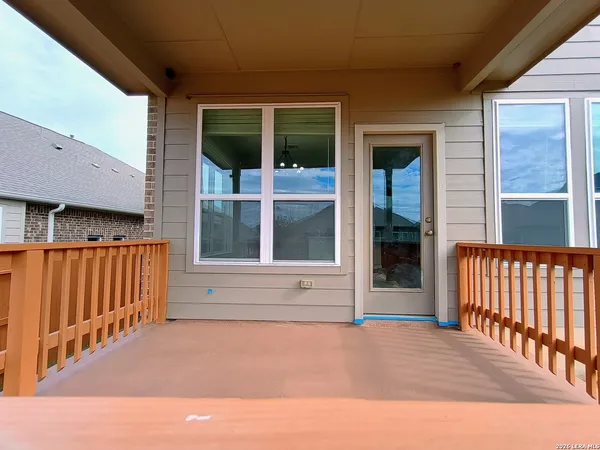a balcony view with a garden space