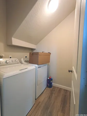 a utility room with dryer and washer
