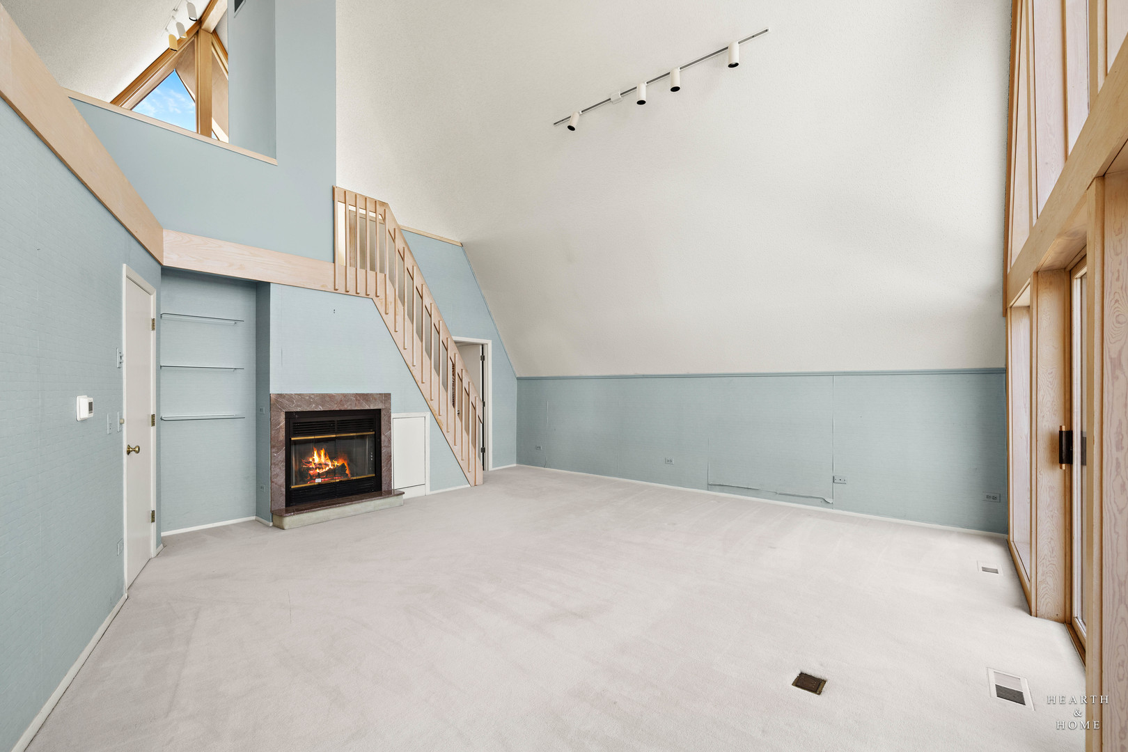7814 North Pillow Hill Road Spring Grove, IL 60081 - Photo 24 of 62 a view of an empty room with a fireplace and a window