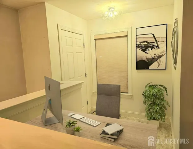 a bathroom with a tub and a shower