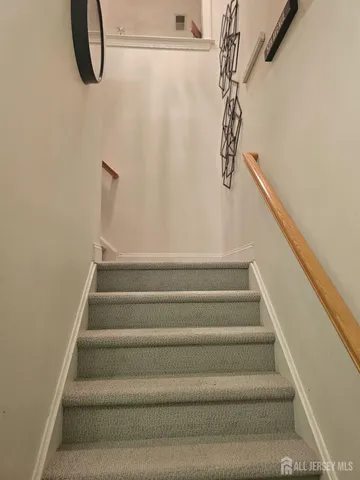 a view of a room with racks and dryer