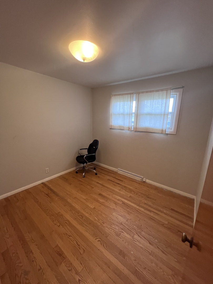 Undisclosed Address Chicago, IL 60656 - Photo 11 of 11 a view of a room with a window