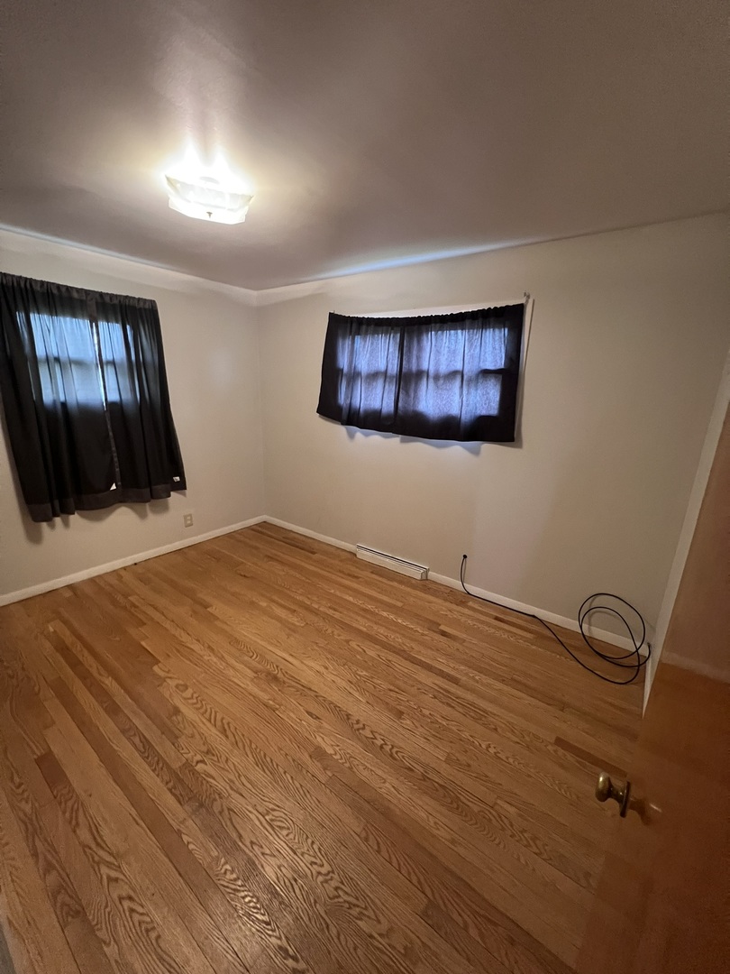 Undisclosed Address Chicago, IL 60656 - Photo 9 of 11 a view of an empty room