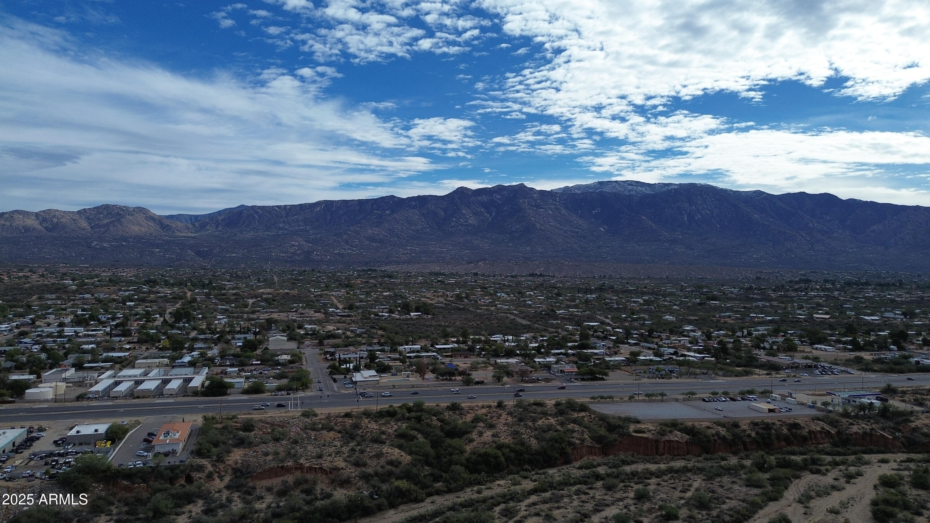 16633 North Oracle Road Tucson, AZ 85739 - Photo 24 of 40 a view of a lush green hillside and houses