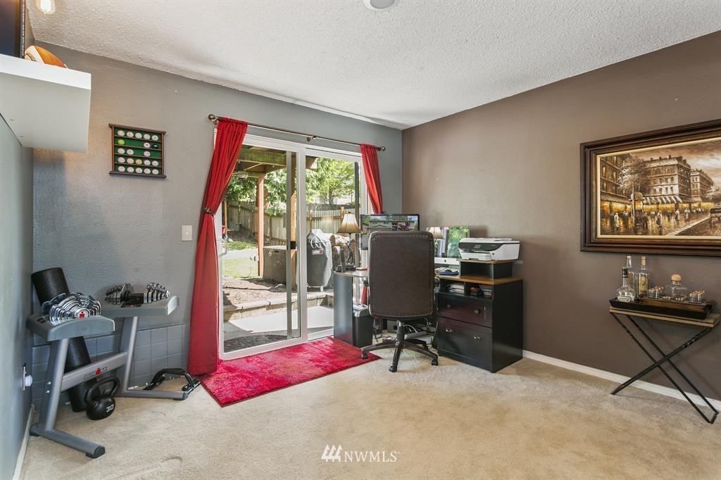 17405 Brook Boulevard Bothell, WA 98012 - Photo 16 of 25 a view of a workspace with furniture and a window