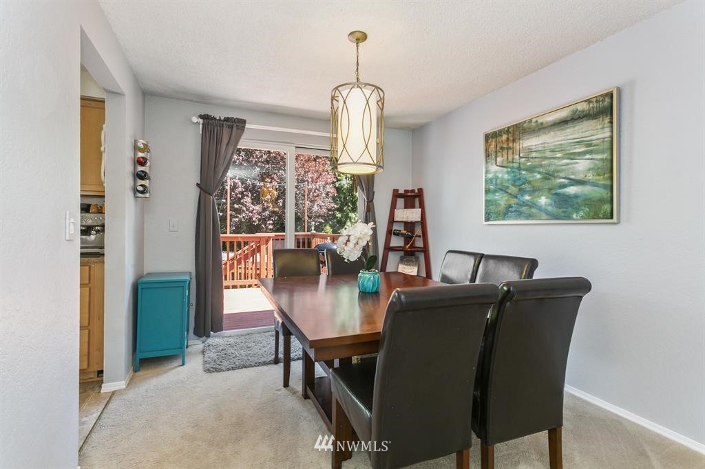 17405 Brook Boulevard Bothell, WA 98012 - Photo 7 of 25 a dining room with furniture and window