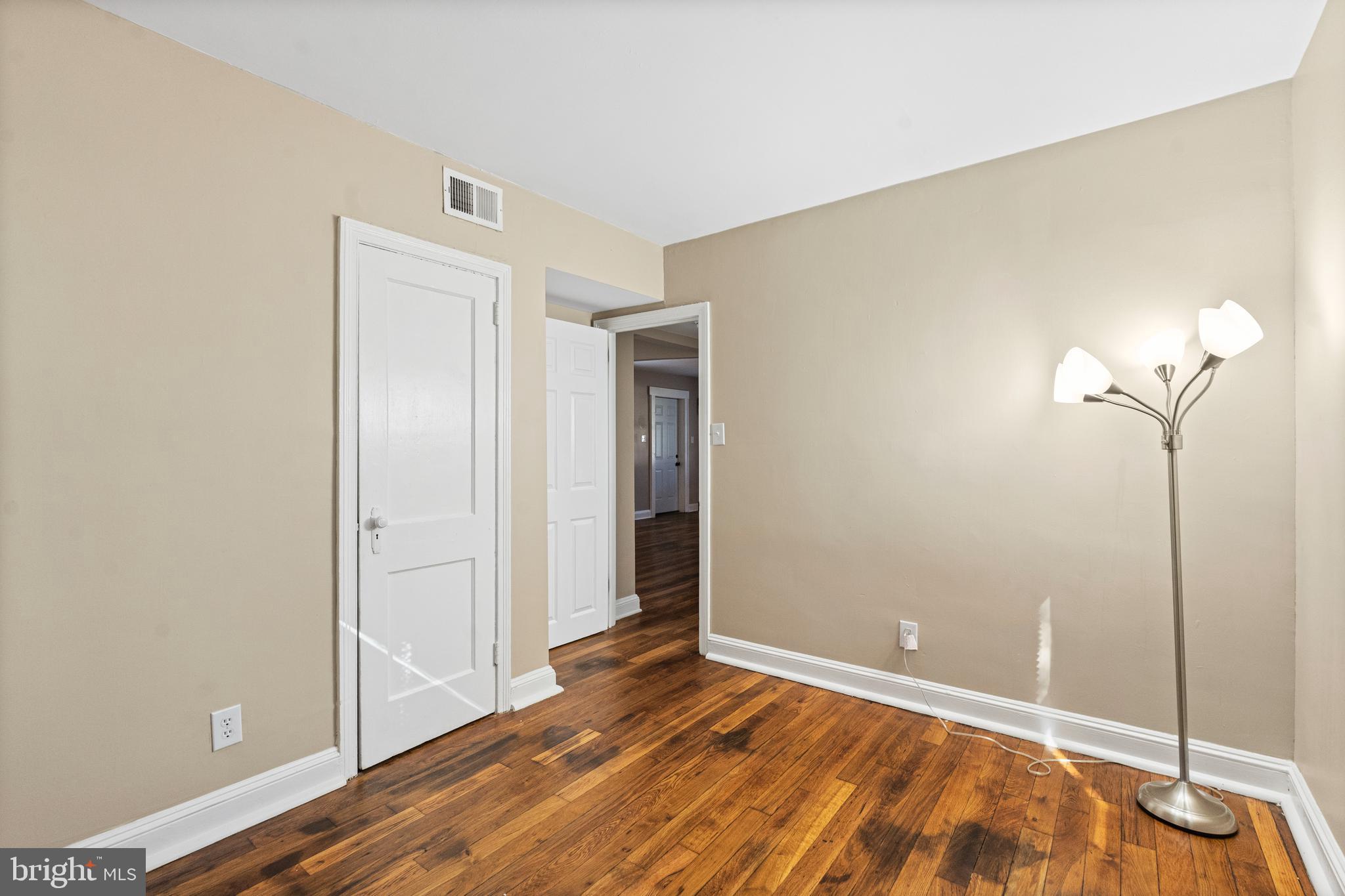 188 Cook Avenue Salem, NJ 08079 - Photo 12 of 25 a view of a room with wooden floor and cabinet