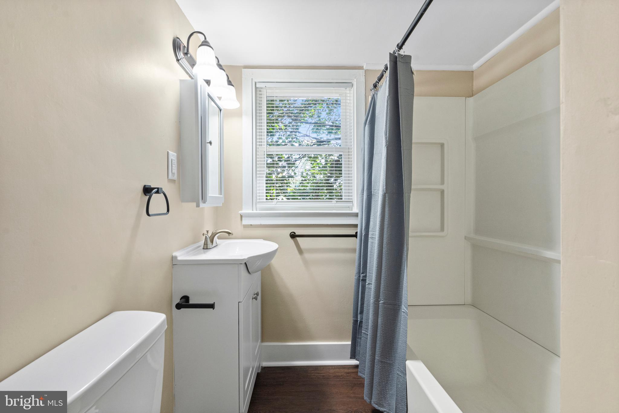 188 Cook Avenue Salem, NJ 08079 - Photo 17 of 25 a bathroom with a sink a toilet and shower