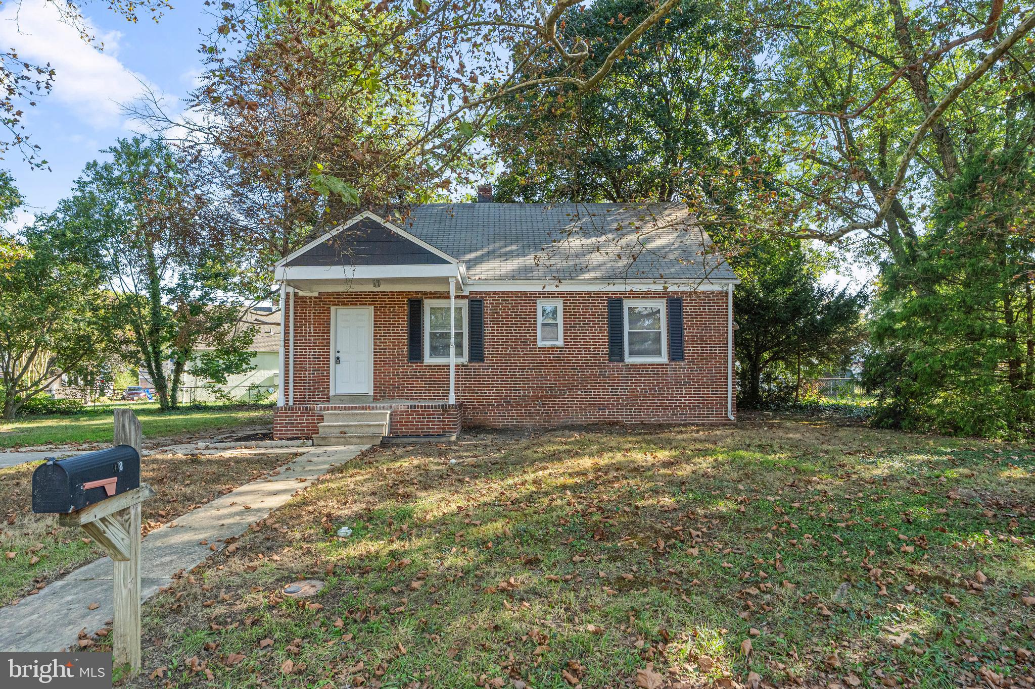 188 Cook Avenue Salem, NJ 08079 - Photo 2 of 25 a house with trees in the background