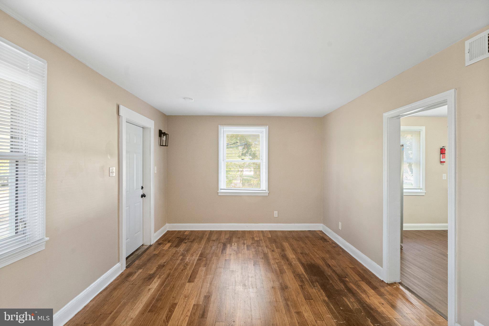188 Cook Avenue Salem, NJ 08079 - Photo 5 of 25 a view of a room with wooden floor and windows