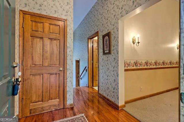 a bedroom with a bed and a fireplace