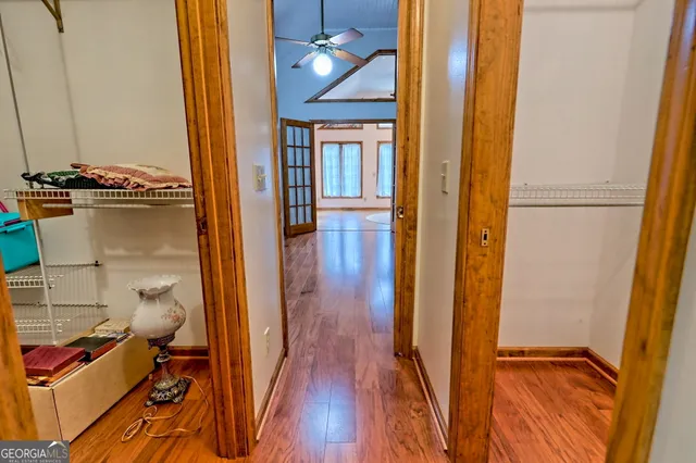 a kitchen with stainless steel appliances granite countertop a refrigerator a stove and a sink with cabinets