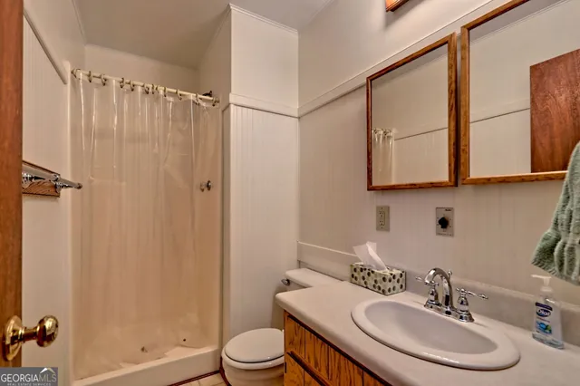 a view of a balcony with wooden floor