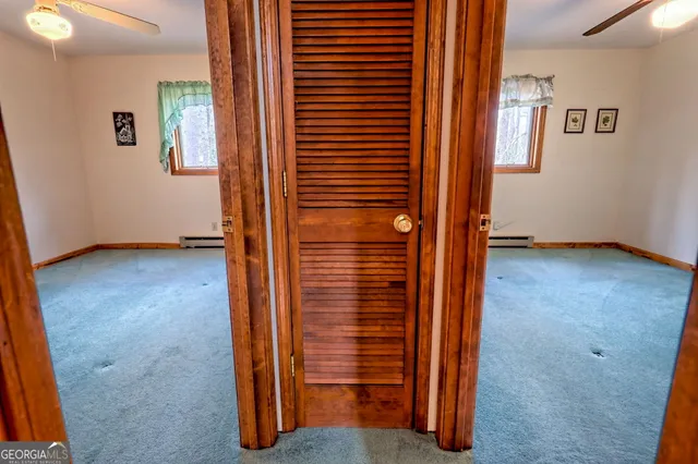 a view of balcony with wooden floor
