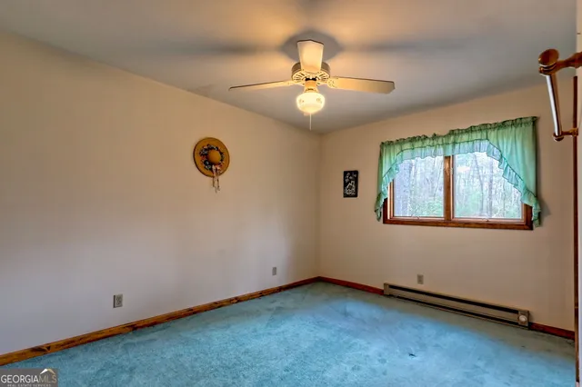 a view of balcony with wooden floor