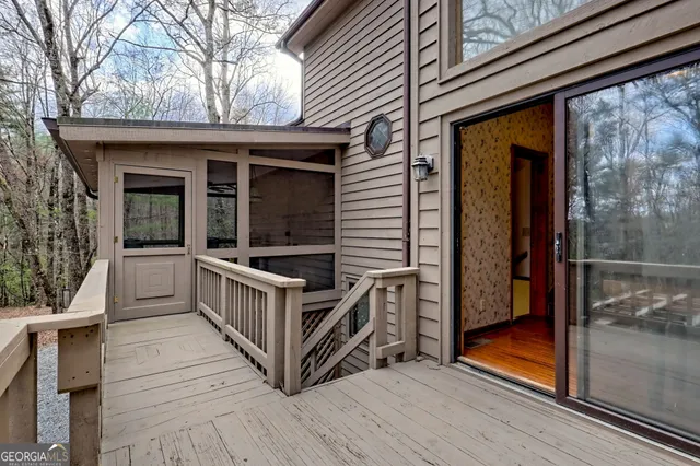 a view of a room with wooden walls