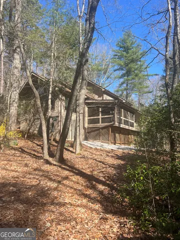 a front view of a house with a garage