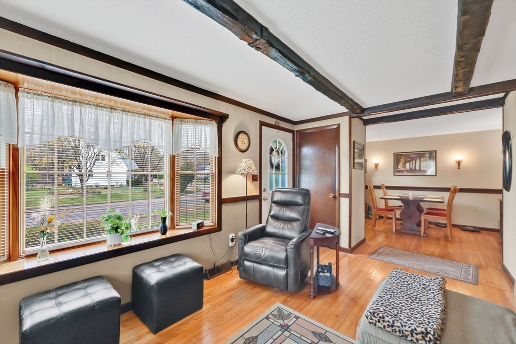 37 Kenneth Road Easthampton, MA 01027 - Photo 13 of 35 a living room with furniture and a floor to ceiling window