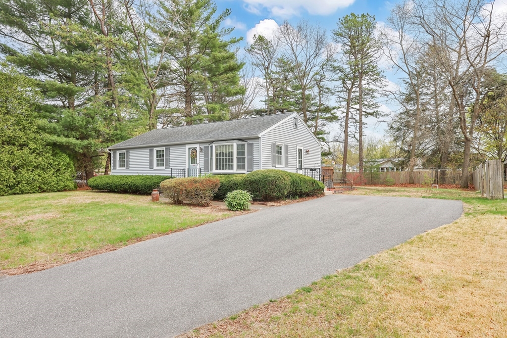 37 Kenneth Road Easthampton, MA 01027 - Photo 2 of 35 a front view of a house with a yard and trees