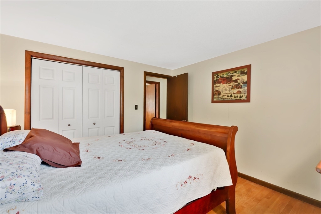 37 Kenneth Road Easthampton, MA 01027 - Photo 23 of 35 a bedroom with a bed and a cabinets