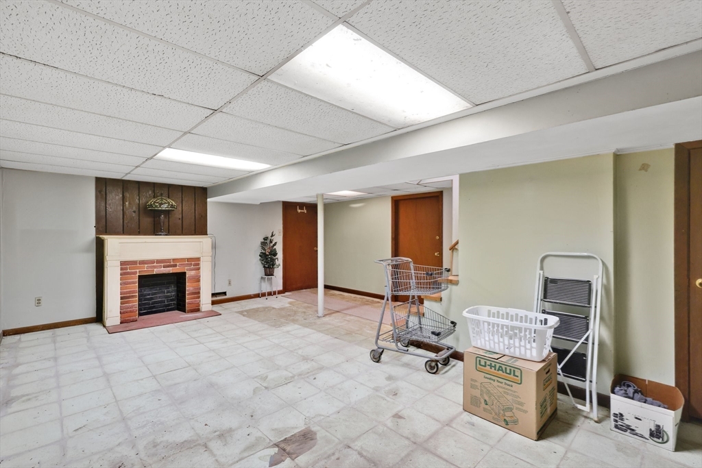37 Kenneth Road Easthampton, MA 01027 - Photo 25 of 35 a view of a livingroom with furniture and a fireplace