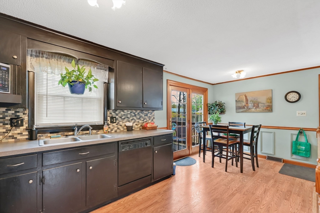 37 Kenneth Road Easthampton, MA 01027 - Photo 4 of 35 a view of kitchen with dining table chairs and wooden floor