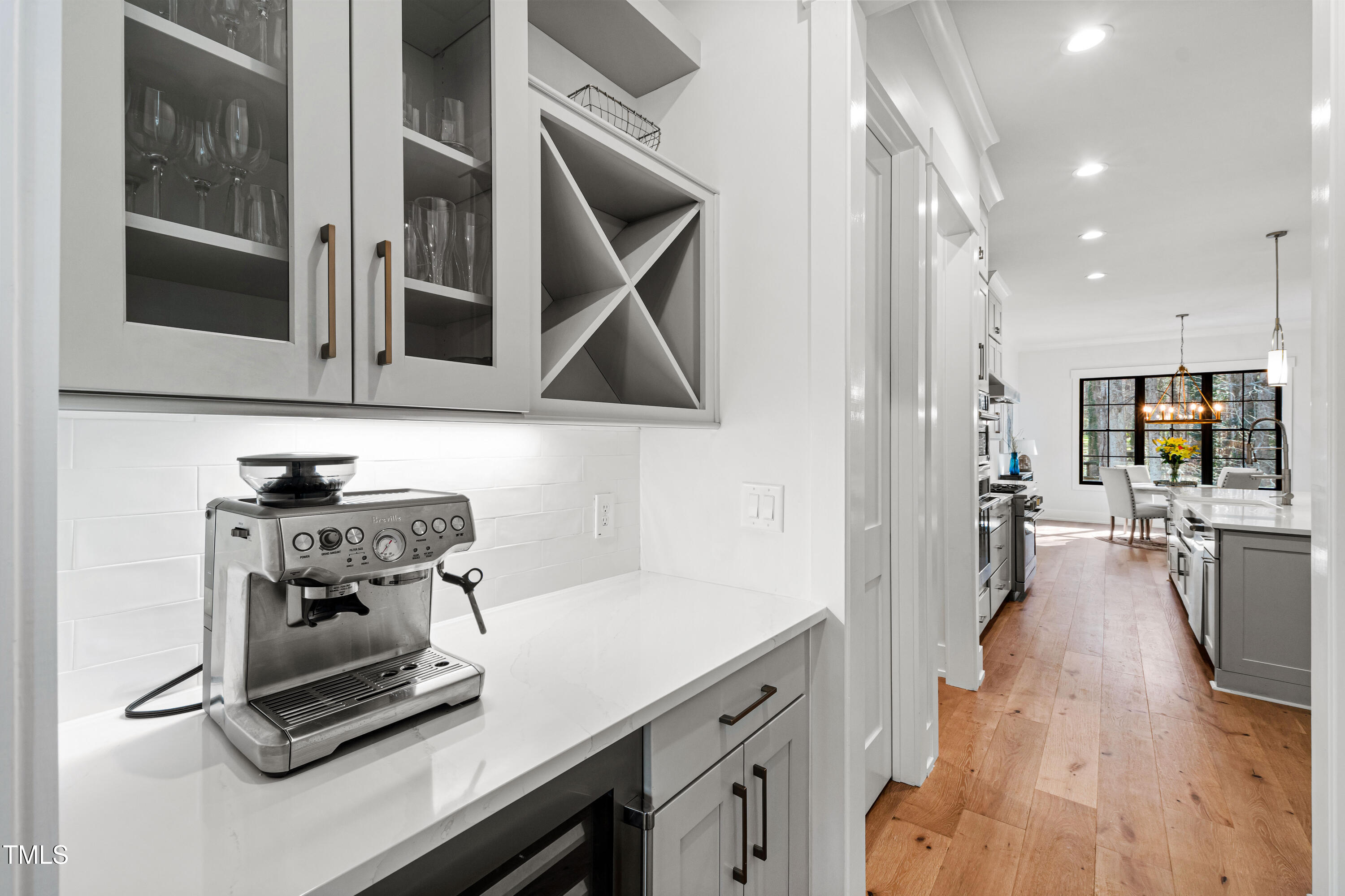 6816 Rainwater Road Raleigh, NC 27615 - Photo 17 of 66 a kitchen with appliances and cabinets