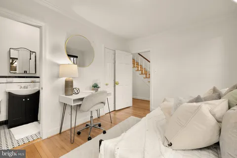 a view of an empty room with a fireplace