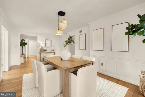 a kitchen with sink and cabinets