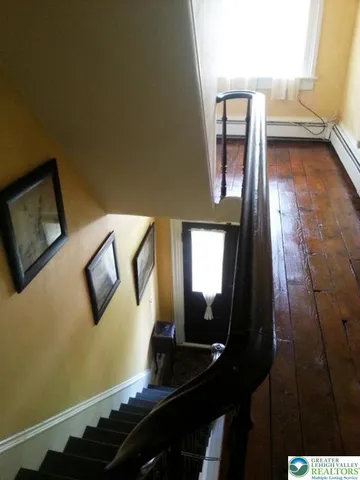 a view of a chairs and table in the patio