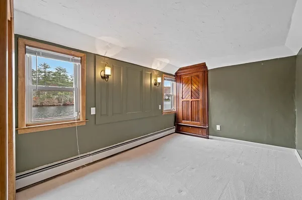 an empty room with windows